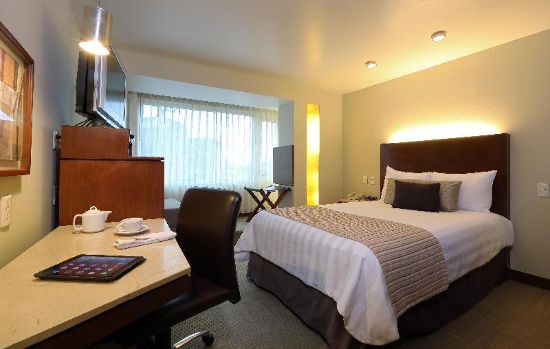 Emporio Reforma Hotel Cidade do México Quarto foto A typical room at the hotel